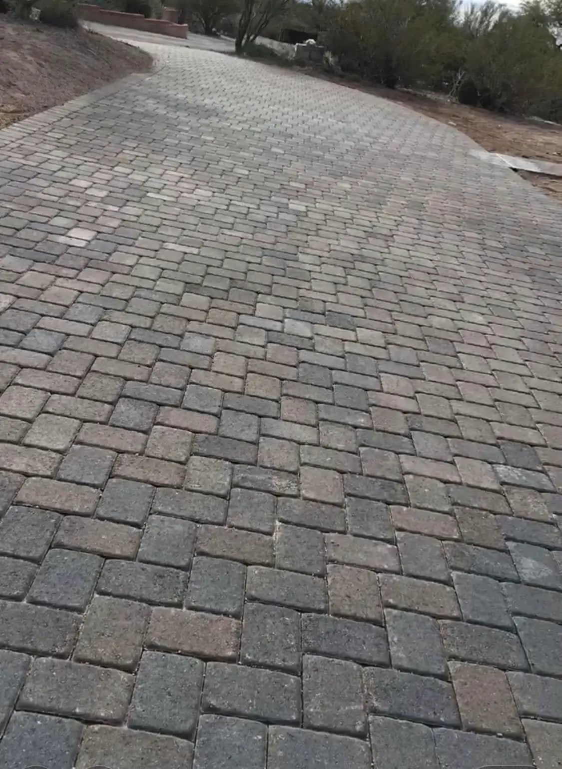 Hand-laid paver driveway by A&J Hardscapes in Tucson, AZ